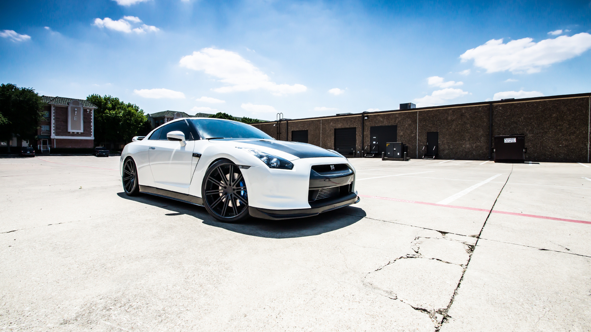 White Coupe Parked on Gray Concrete Floor During Daytime. Wallpaper in 1920x1080 Resolution