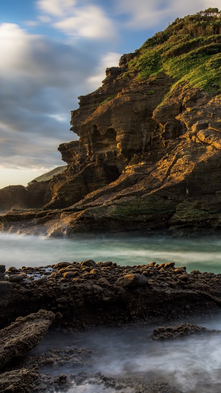 Brown Rock Formation on Sea During Daytime. Wallpaper in 720x1280 Resolution