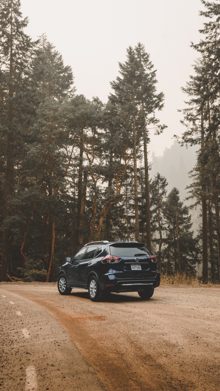 Black Car on Dirt Road Near Trees During Daytime. Wallpaper in 720x1280 Resolution