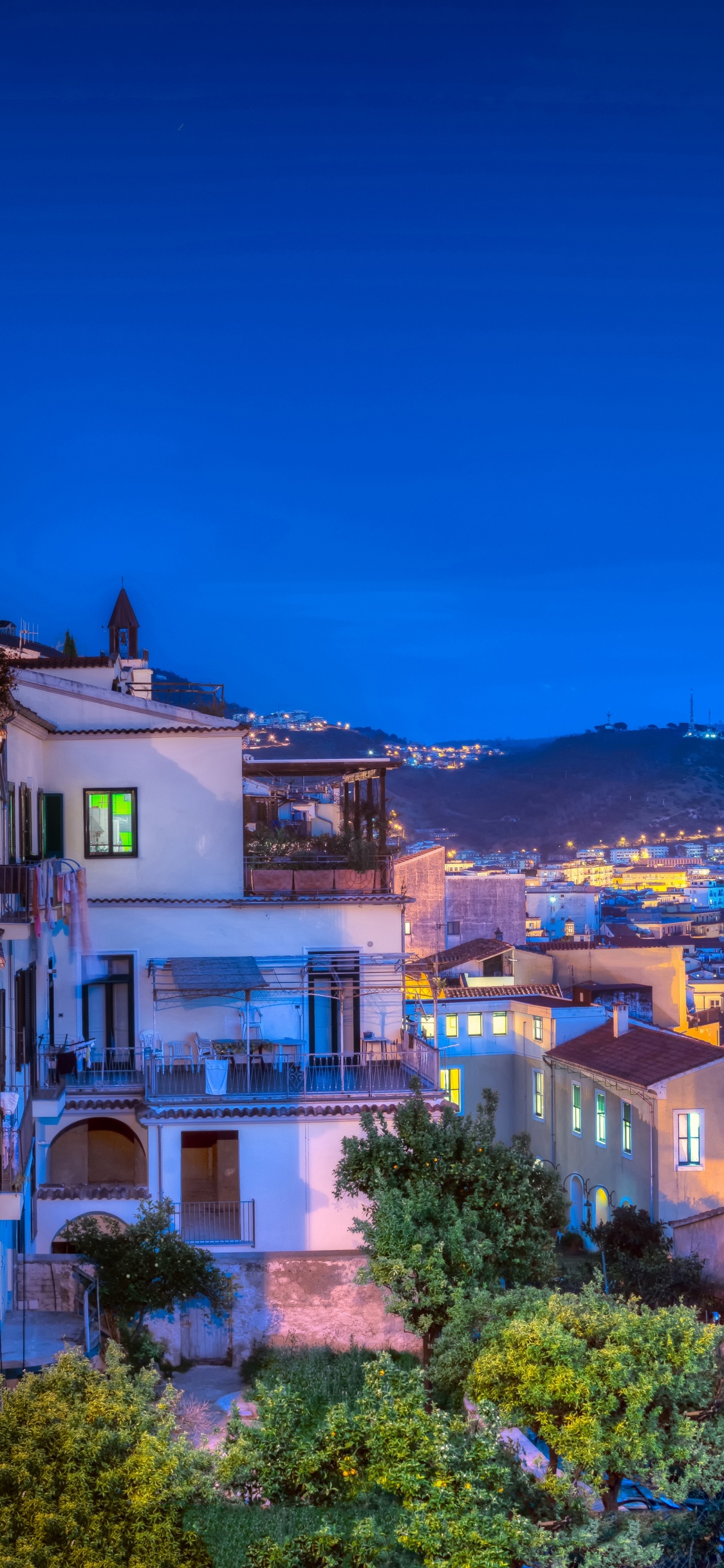 White and Brown Concrete Building. Wallpaper in 1125x2436 Resolution