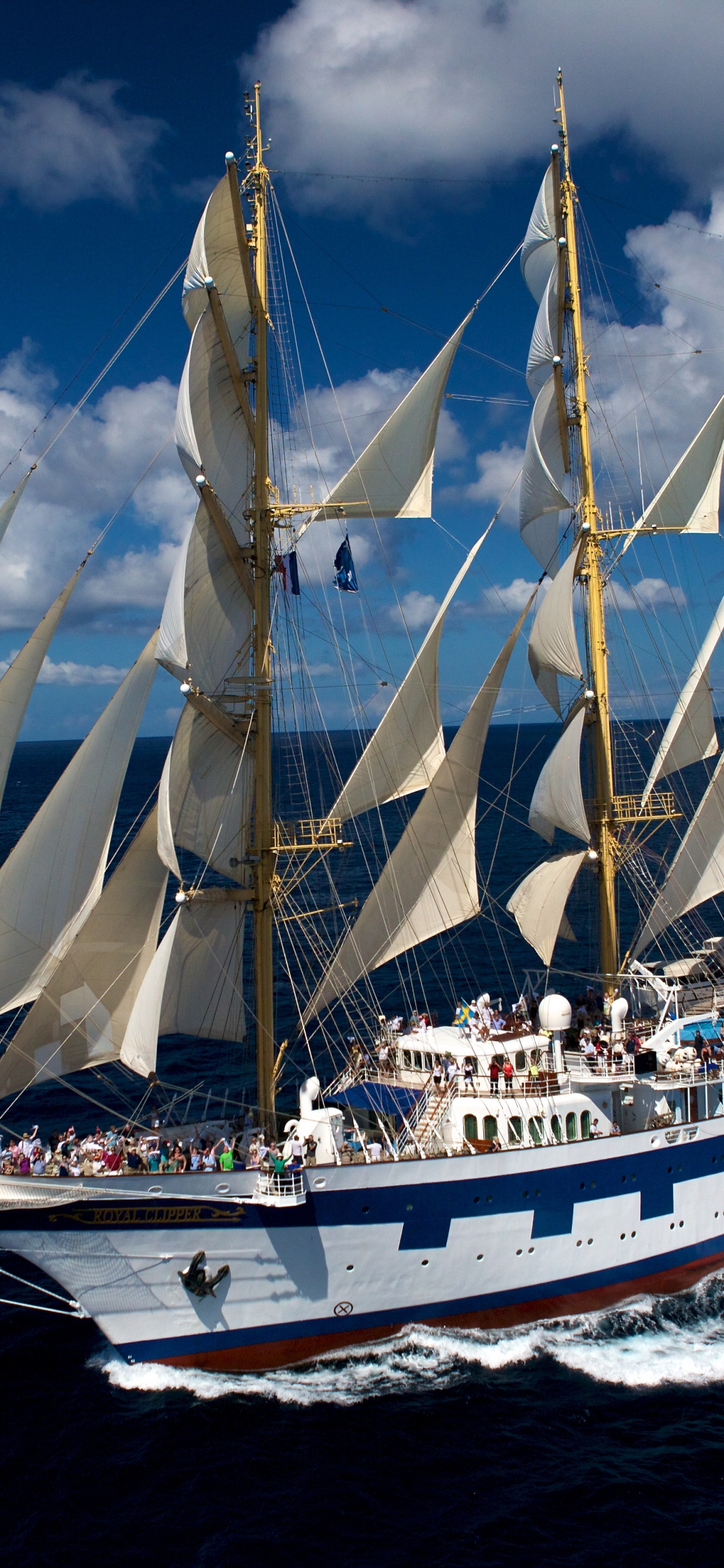White Sail Boat on Sea Under Blue Sky During Daytime. Wallpaper in 1242x2688 Resolution