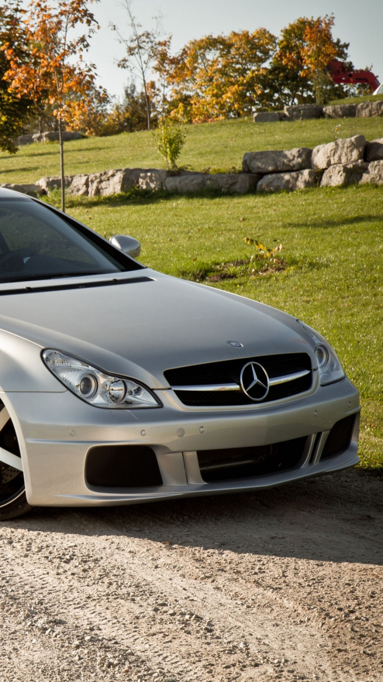 Silver Mercedes Benz Coupe on Road During Daytime. Wallpaper in 750x1334 Resolution