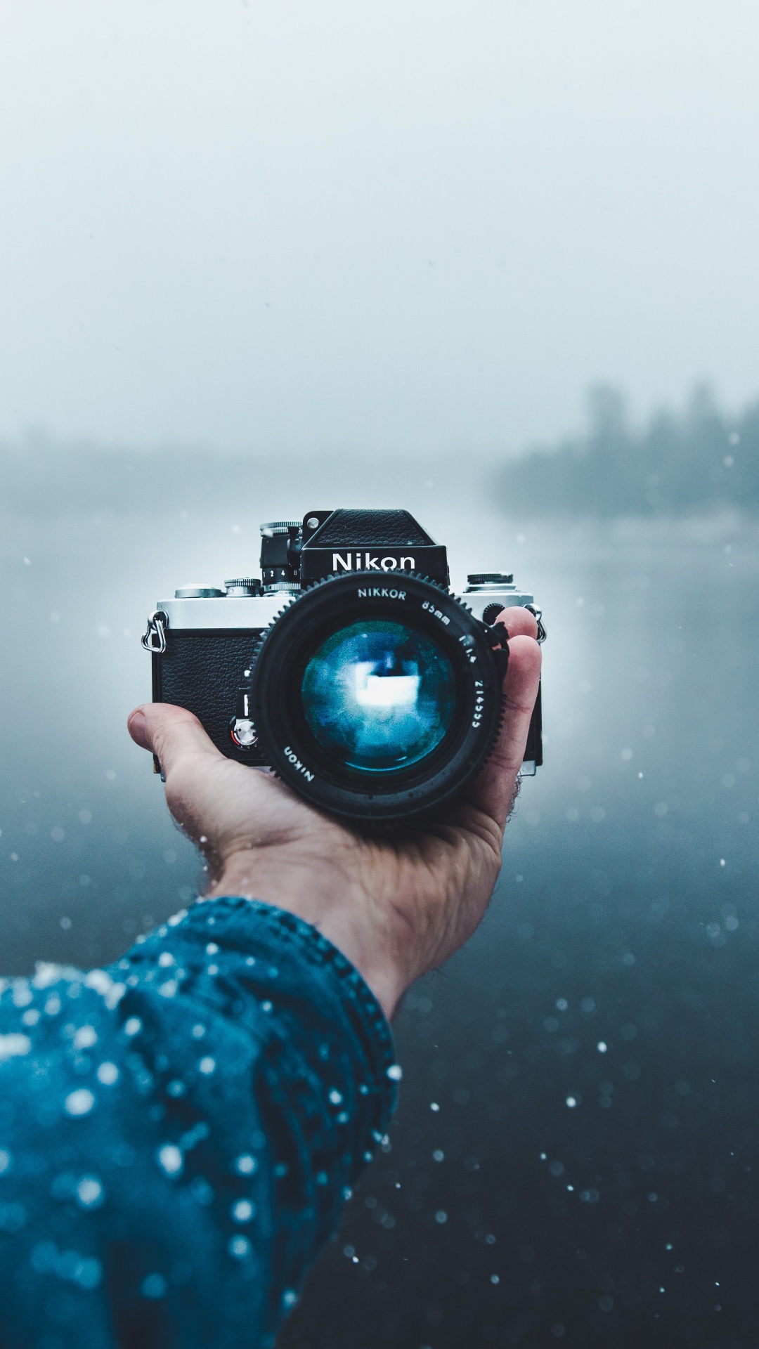 Person Holding Black Dslr Camera. Wallpaper in 1080x1920 Resolution
