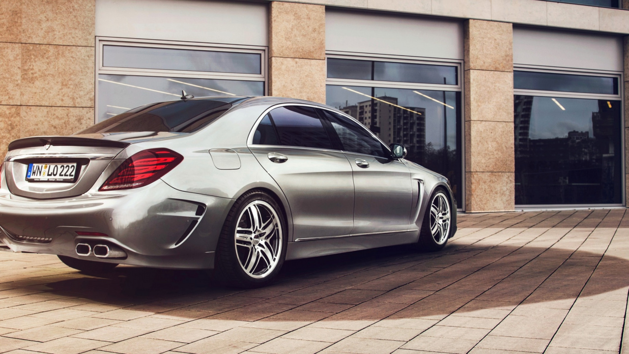 Silver Mercedes Benz Coupe Parked on Brown Brick Floor. Wallpaper in 1280x720 Resolution