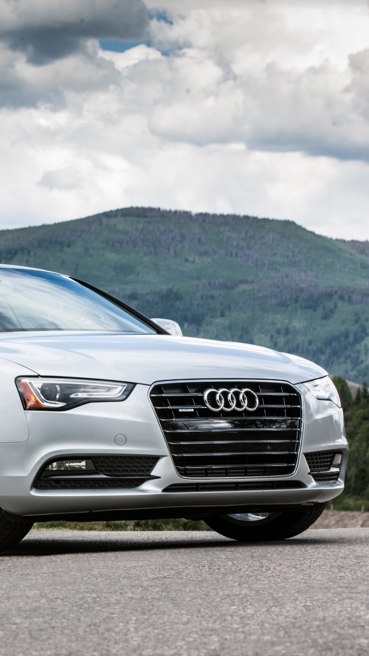 Silver Audi a 4 Sedan on Brown Dirt Road During Daytime. Wallpaper in 750x1334 Resolution