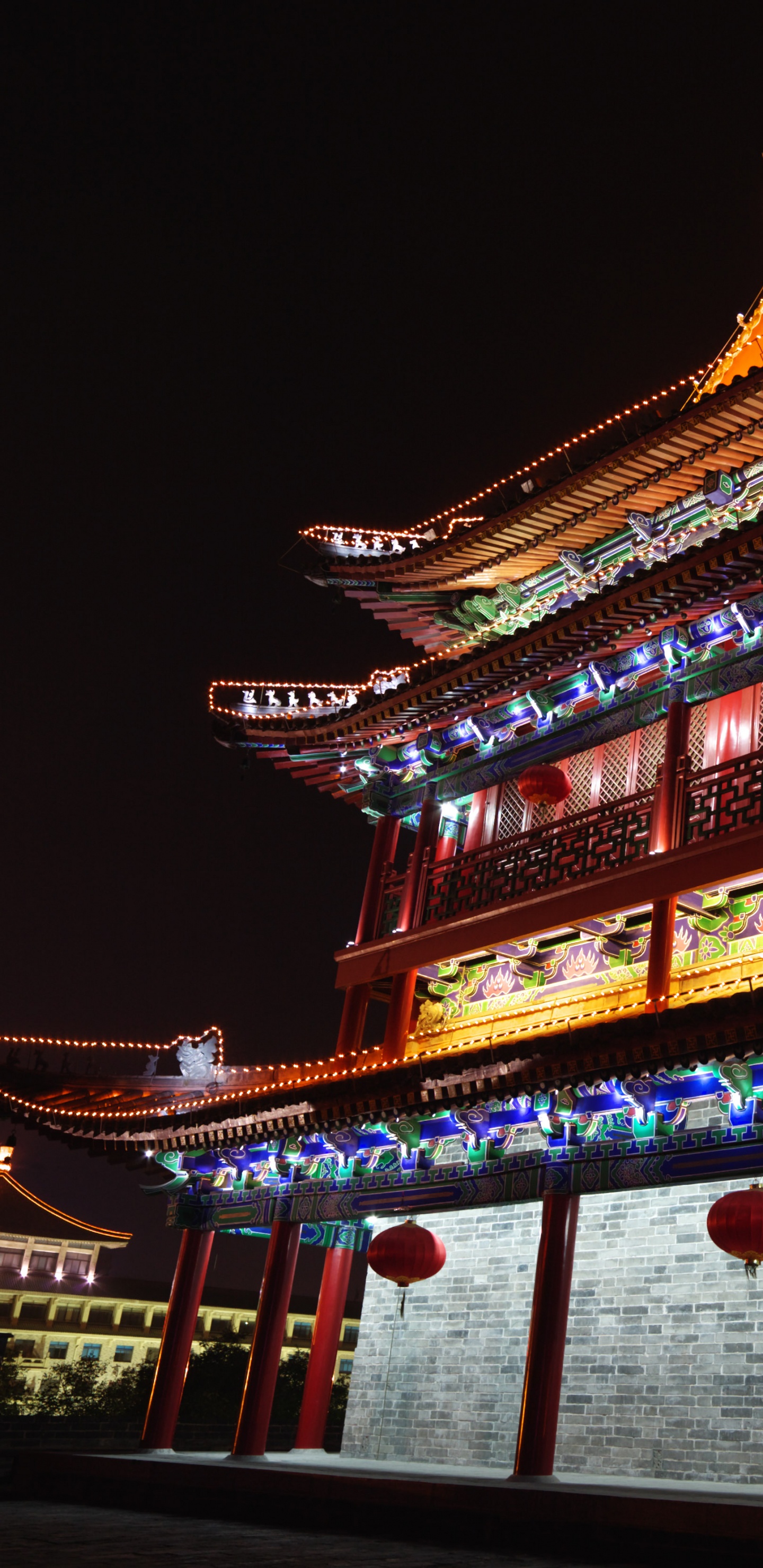 Brown and White Wooden Temple During Night Time. Wallpaper in 1440x2960 Resolution