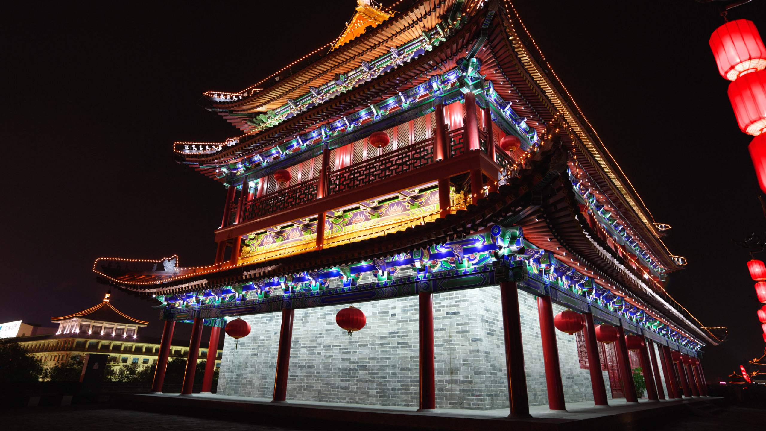 Brown and White Wooden Temple During Night Time. Wallpaper in 2560x1440 Resolution