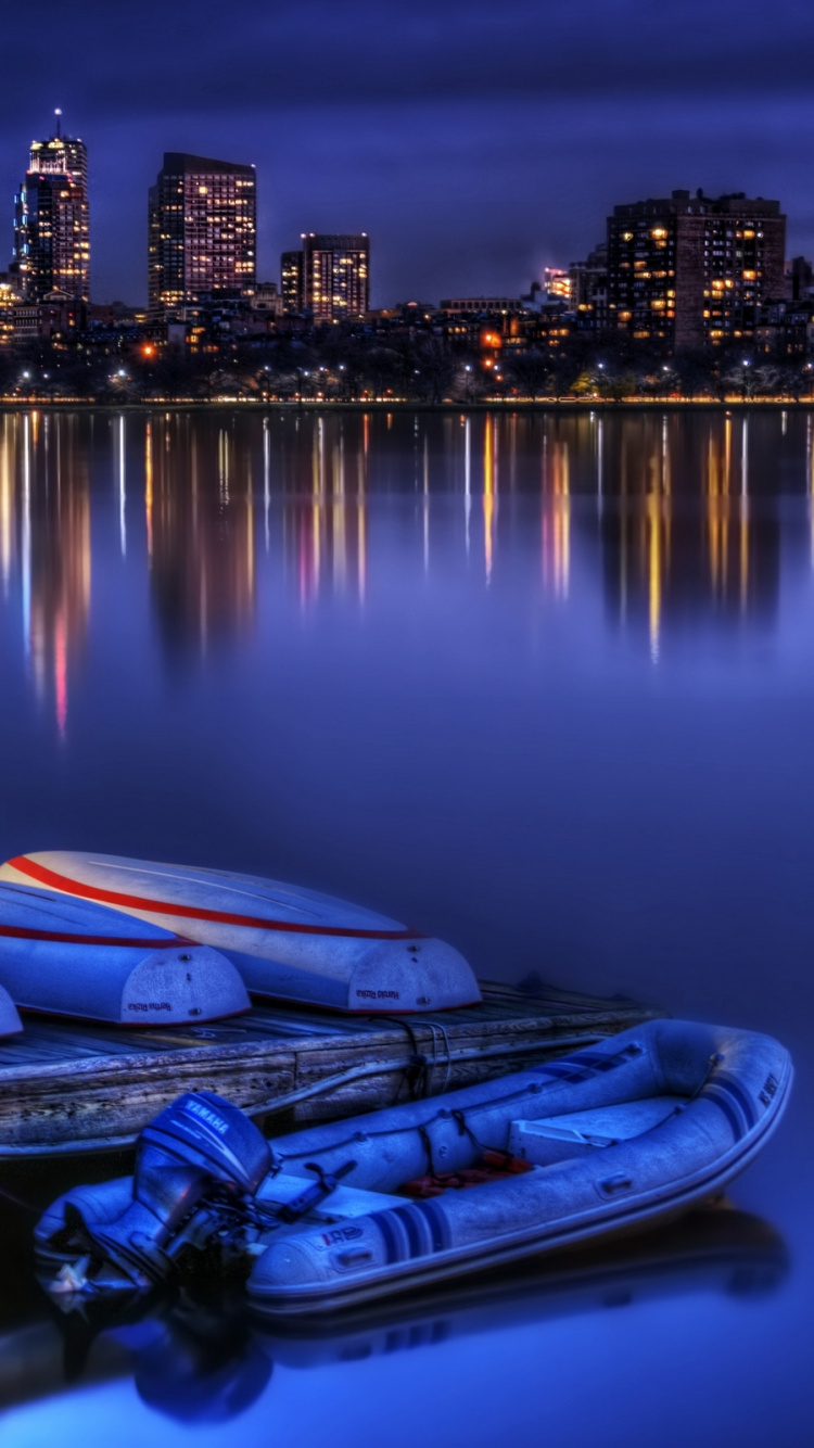 Blue and White Boat on Water During Night Time. Wallpaper in 750x1334 Resolution