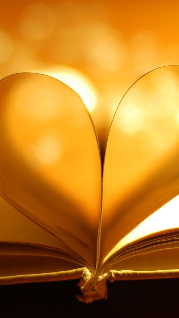 Heart Shaped Yellow Light in Close up Photography. Wallpaper in 720x1280 Resolution