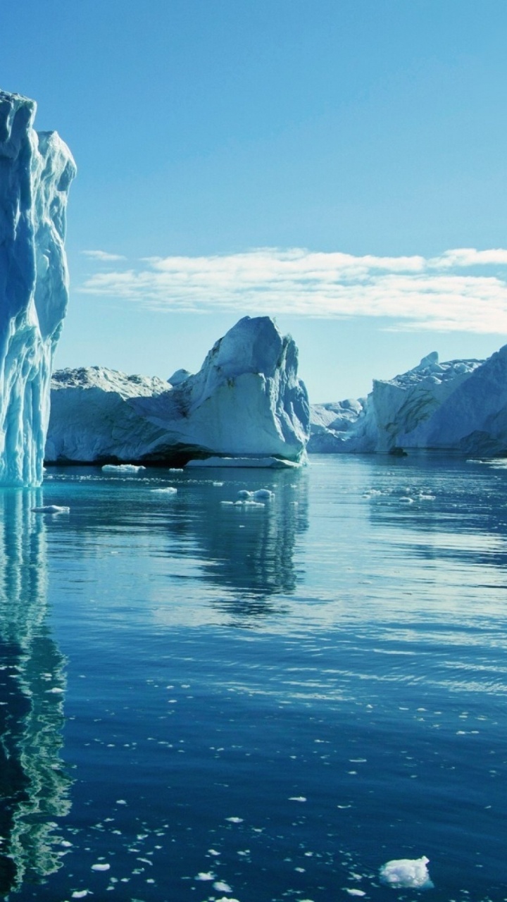 White Ice on Body of Water Near Mountain During Daytime. Wallpaper in 720x1280 Resolution