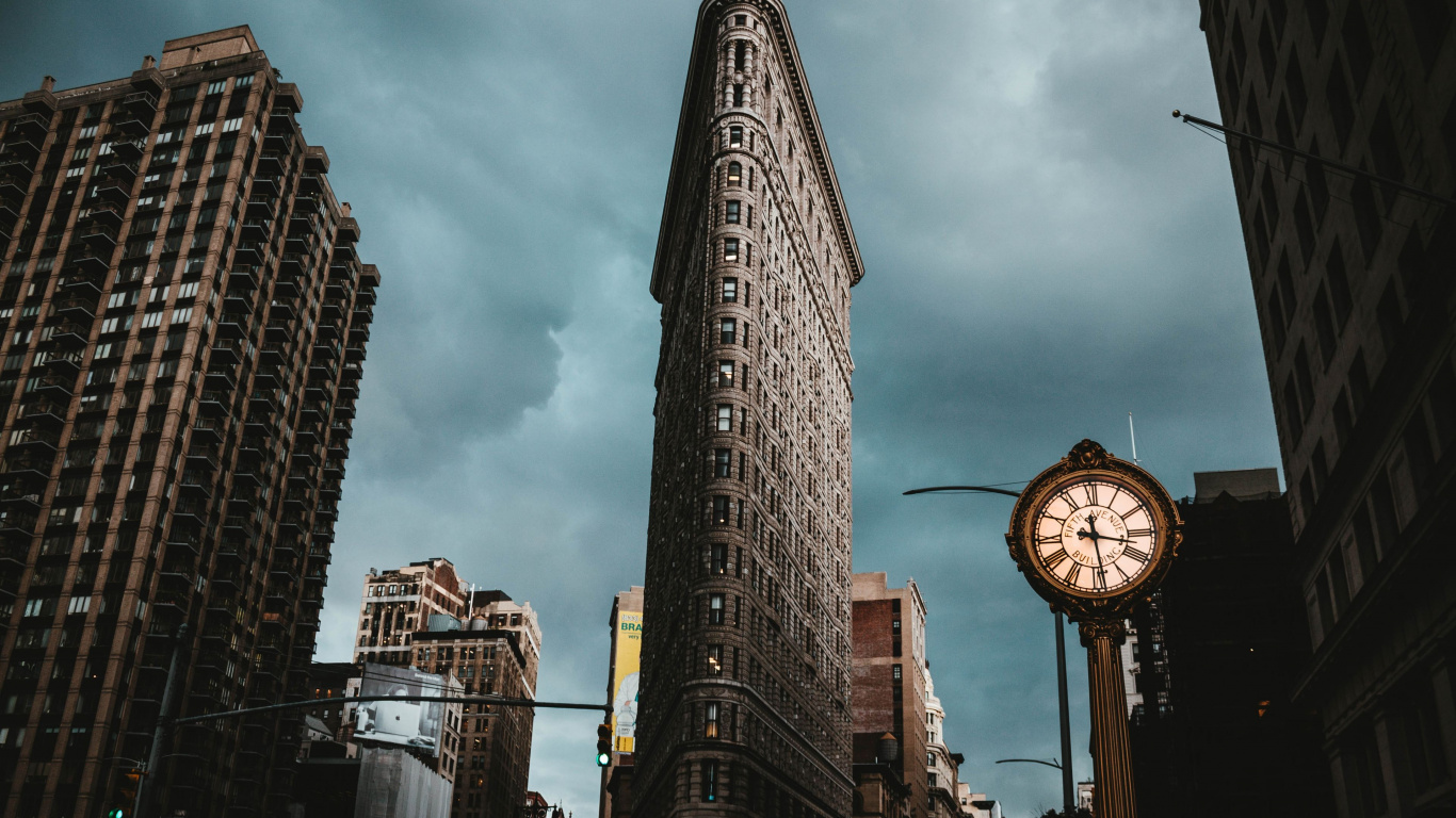 Gray Concrete Building Under Cloudy Sky During Daytime. Wallpaper in 1366x768 Resolution