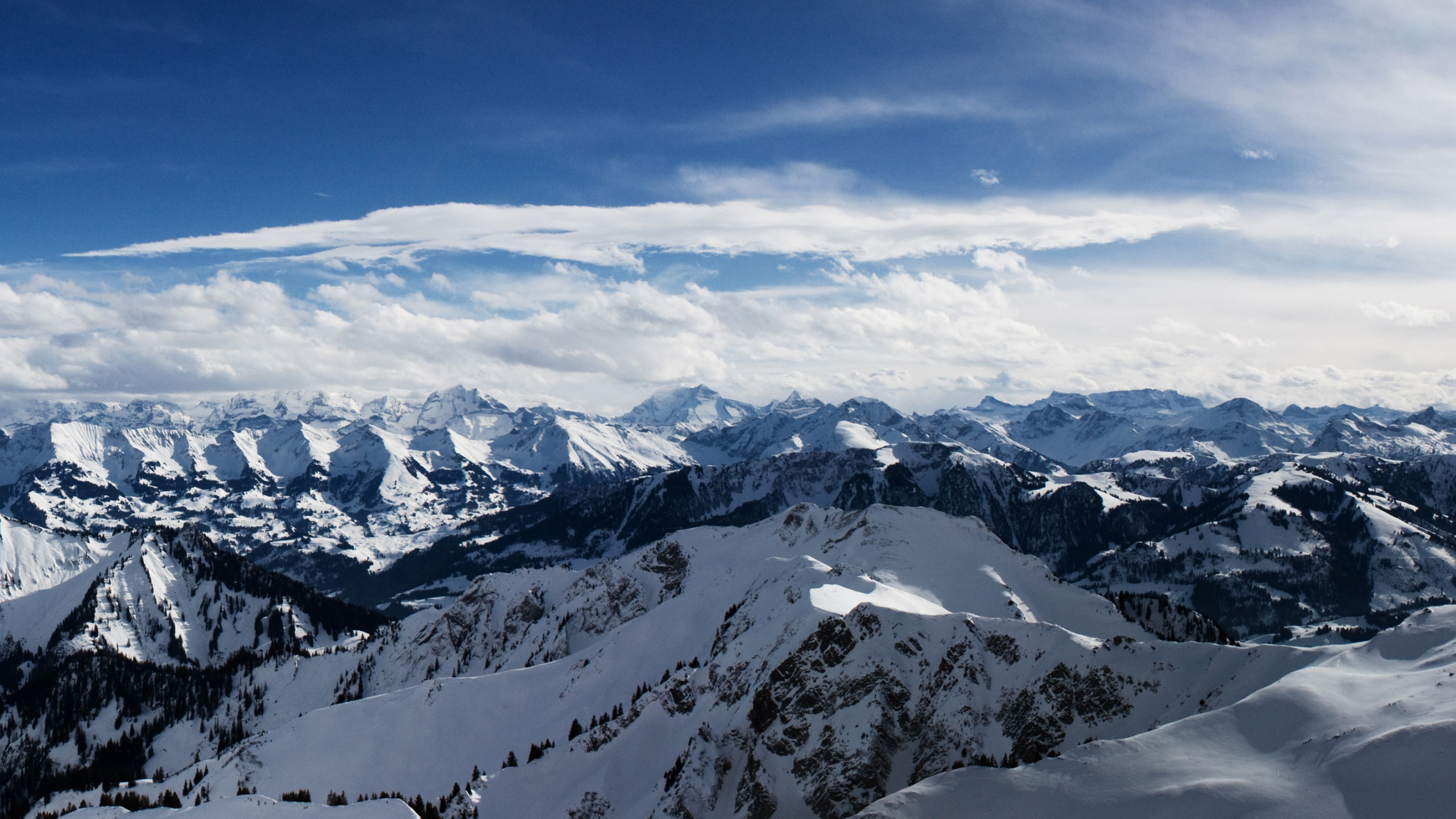 Snow Covered Mountain Under Blue Sky During Daytime. Wallpaper in 2560x1440 Resolution