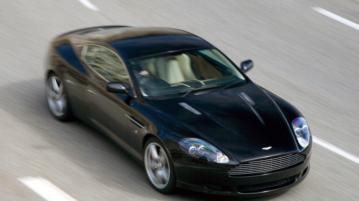 Porsche 911 Noire Sur Route. Wallpaper in 1366x768 Resolution