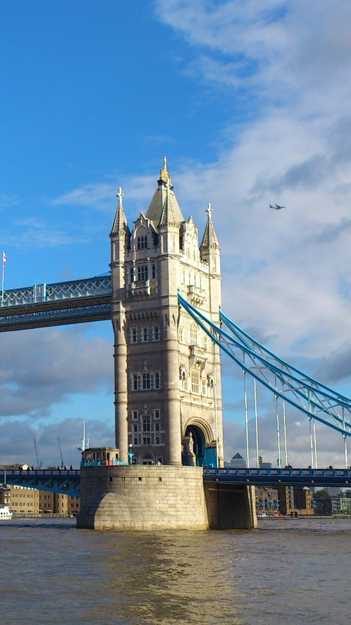 Gray Concrete Bridge Under Blue Sky During Daytime. Wallpaper in 720x1280 Resolution