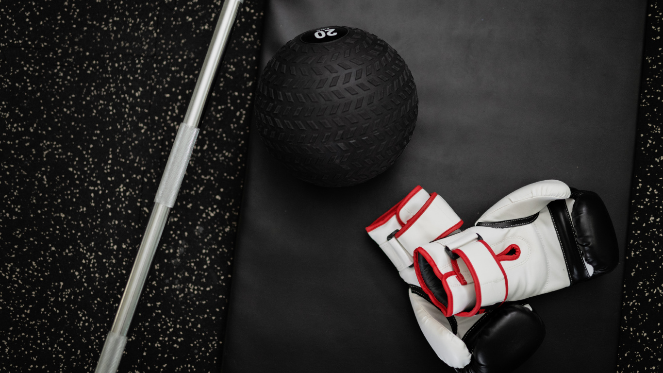 White and Red Soccer Ball Beside Black Ball. Wallpaper in 1366x768 Resolution