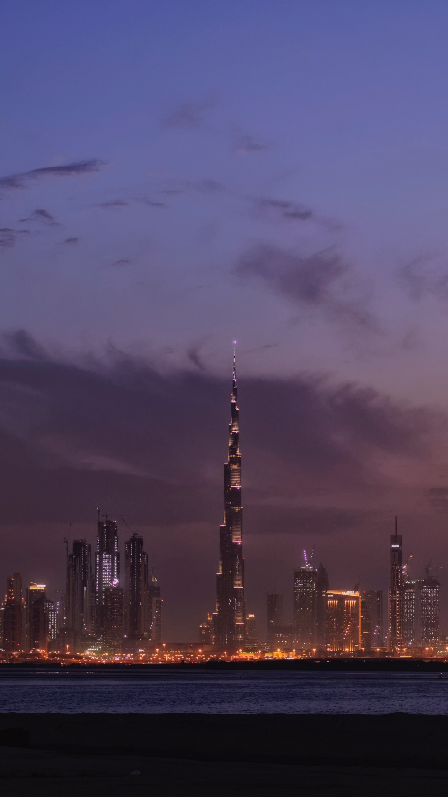 City Skyline During Night Time. Wallpaper in 1440x2560 Resolution