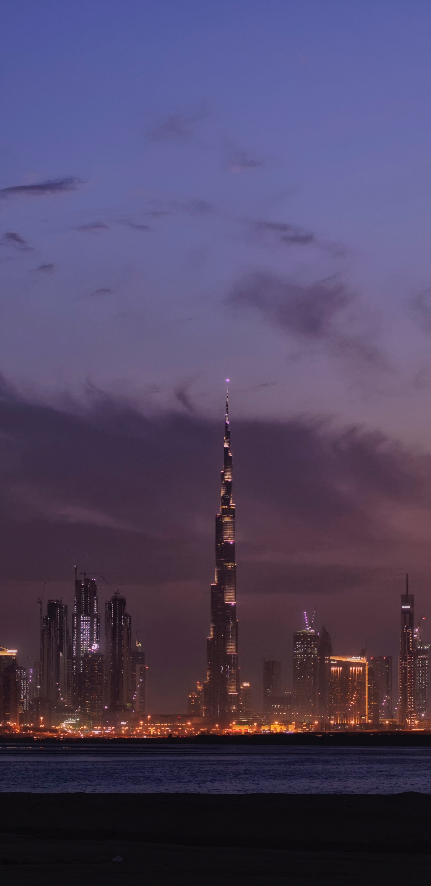 City Skyline During Night Time. Wallpaper in 1440x2960 Resolution