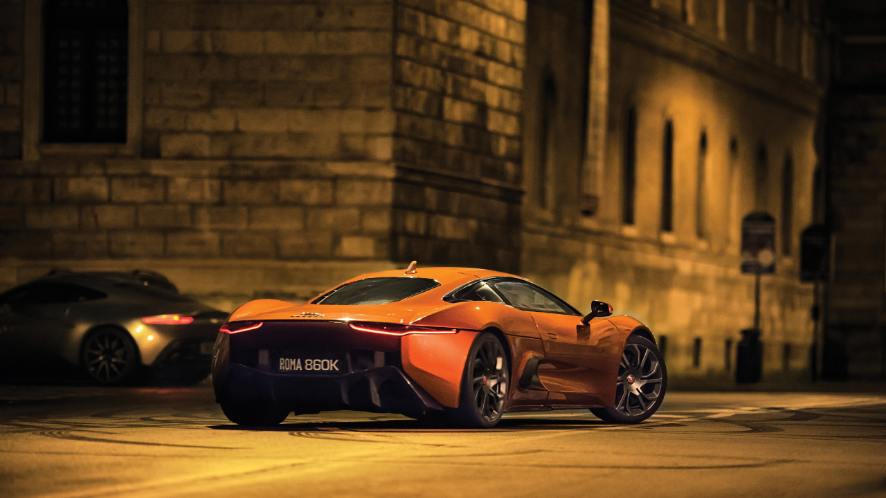 Porsche 911 Orange Sur Route Pendant la Journée. Wallpaper in 1280x720 Resolution