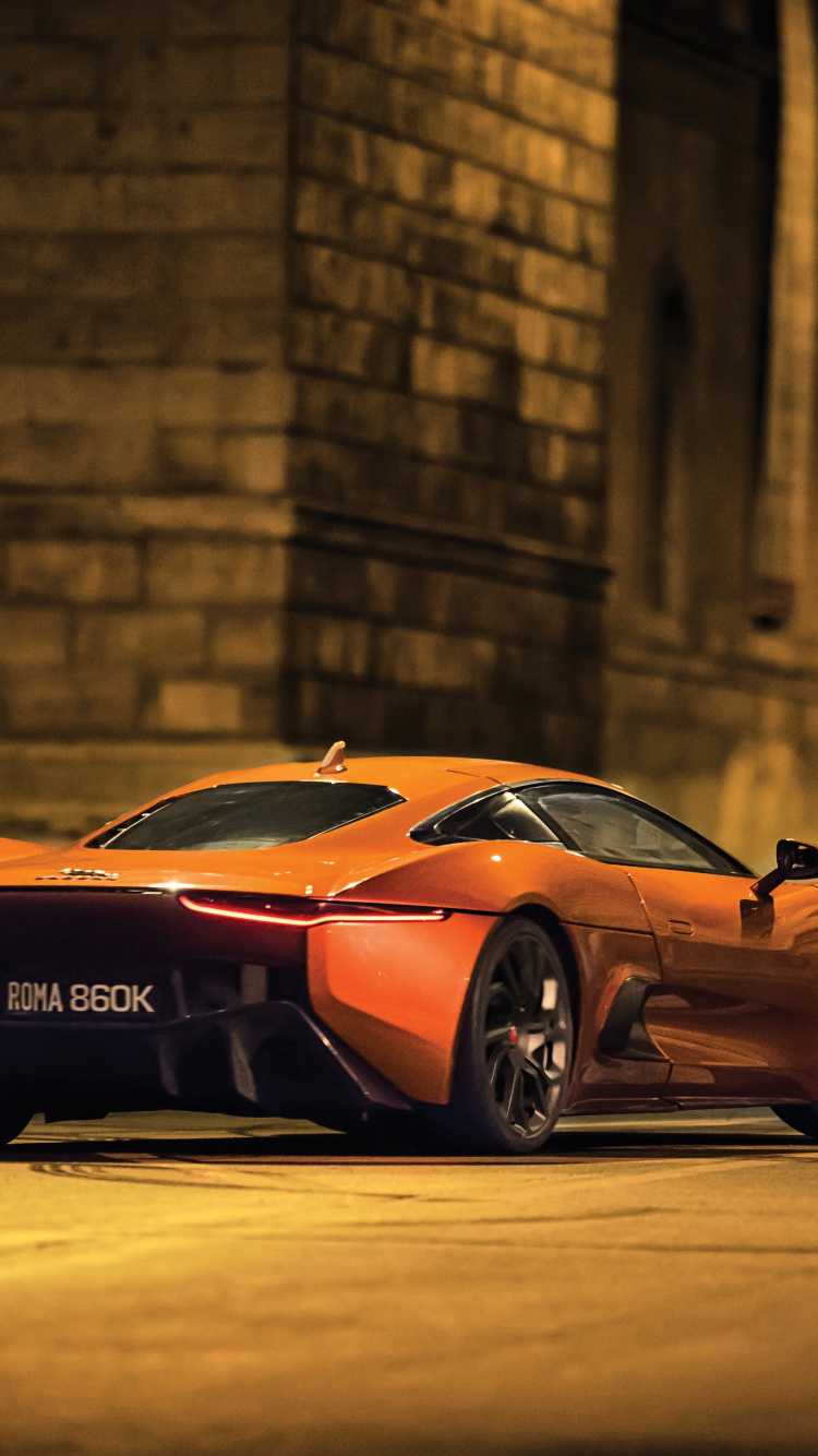 Porsche 911 Orange Sur Route Pendant la Journée. Wallpaper in 750x1334 Resolution