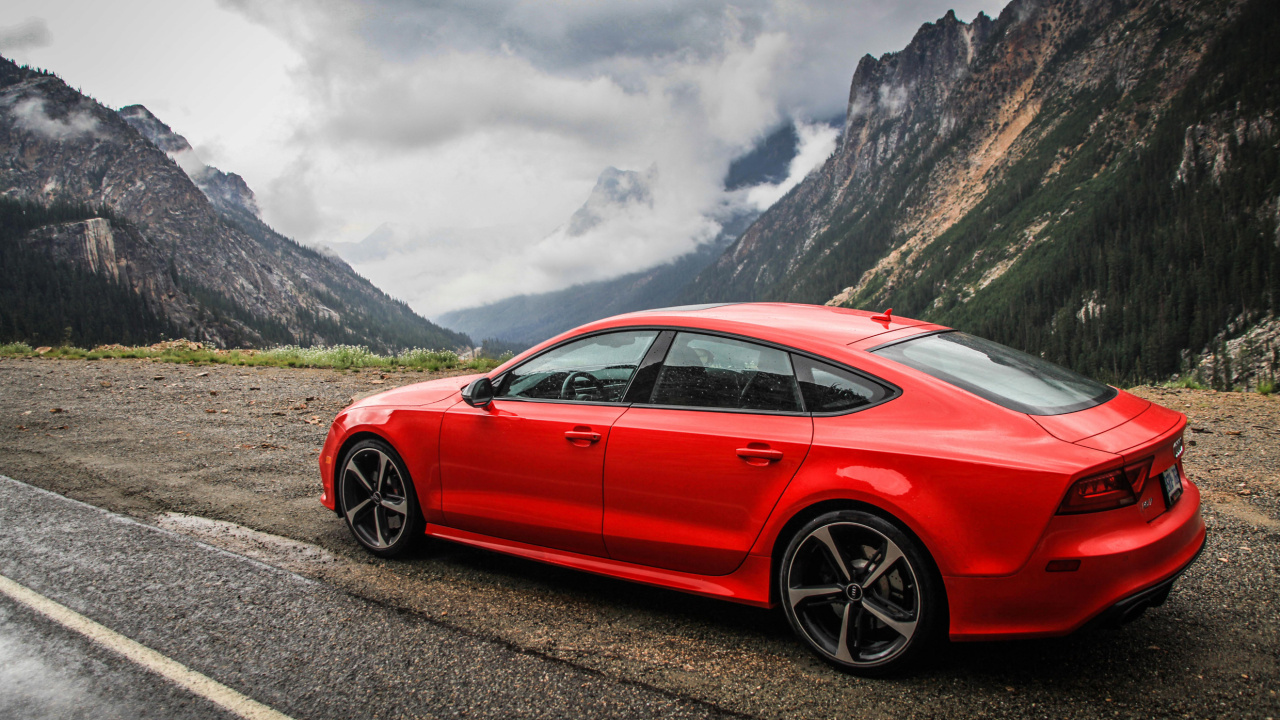 Red Sedan on Black Soil Near Green Grass Field During Daytime. Wallpaper in 1280x720 Resolution