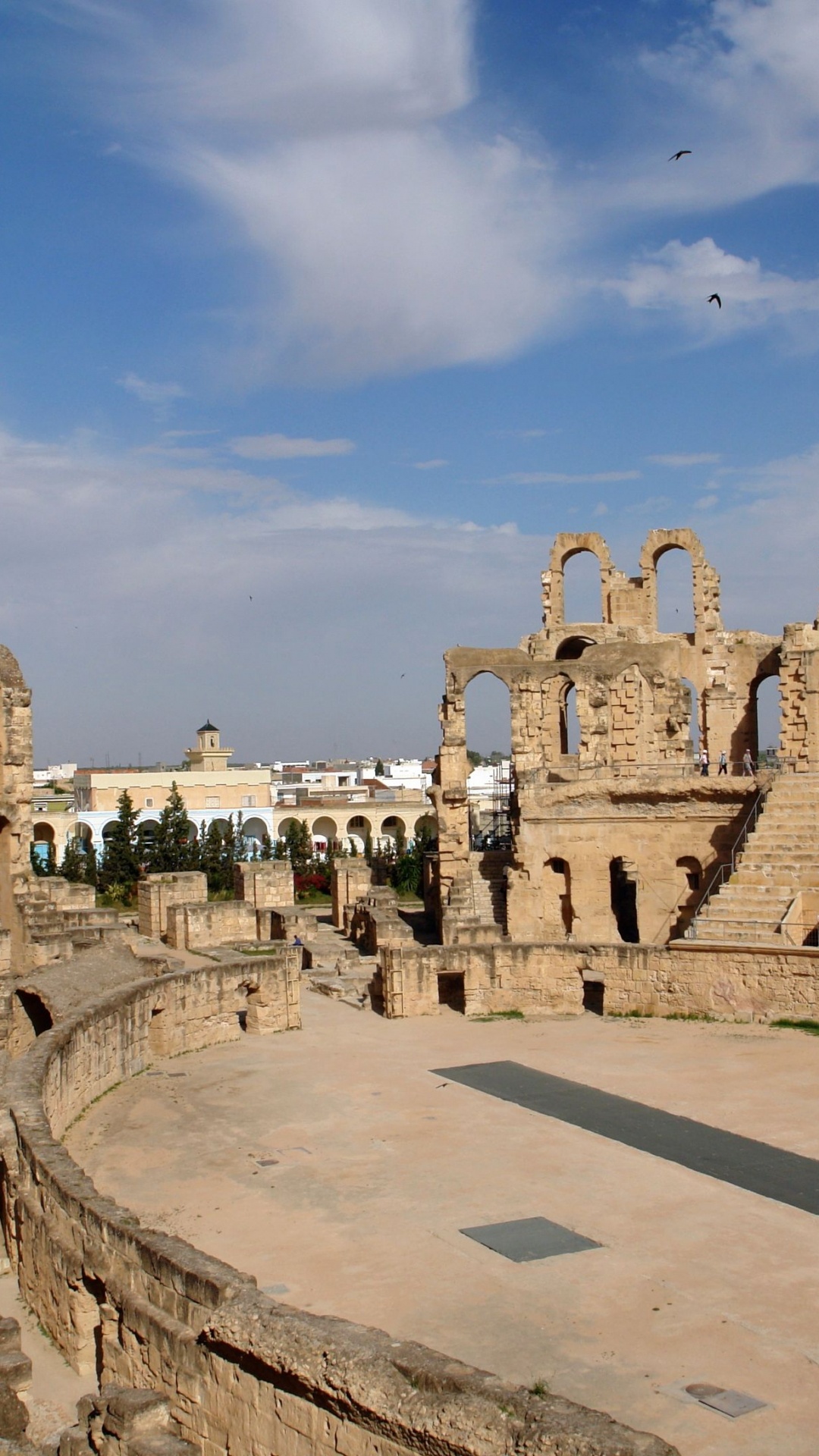 Brown Concrete Building Under Blue Sky During Daytime. Wallpaper in 1080x1920 Resolution