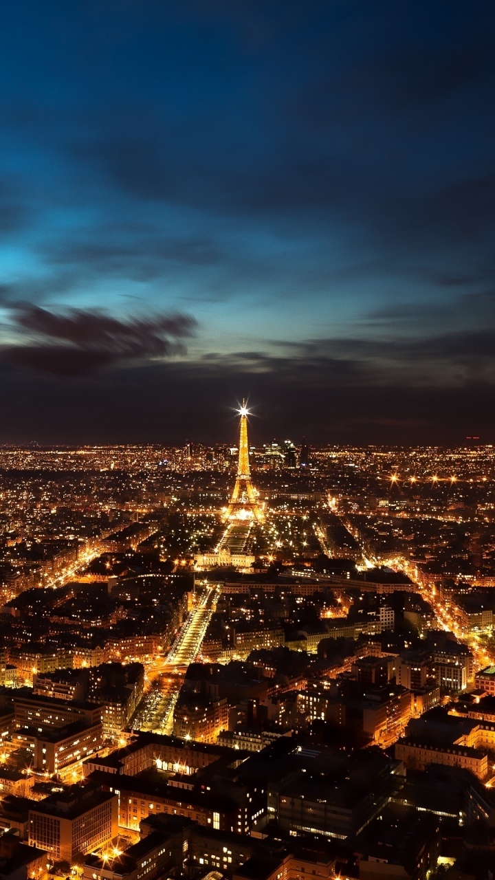 City Skyline Under Blue Sky During Night Time. Wallpaper in 720x1280 Resolution