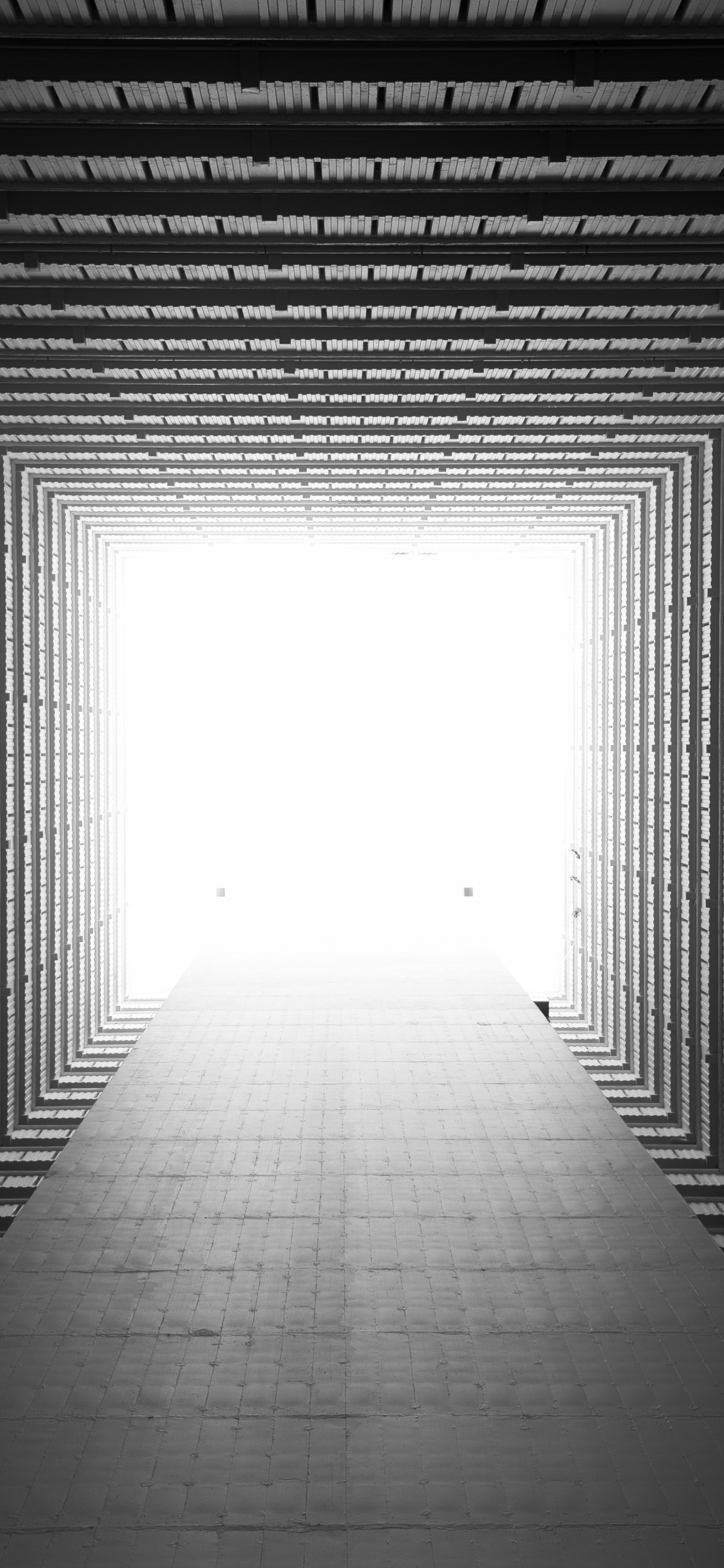 Grayscale Photo of Empty Hallway. Wallpaper in 1242x2688 Resolution