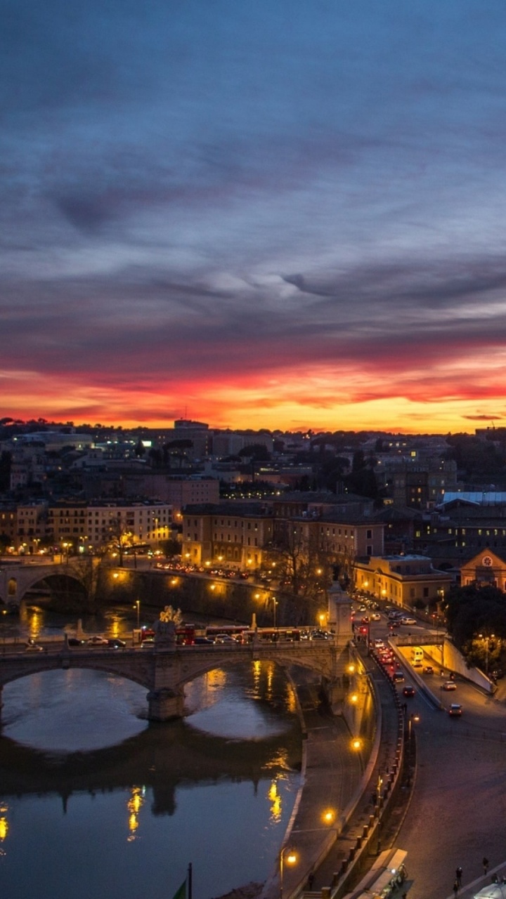 Ciudad Con Edificios de Gran Altura Durante la Noche.. Wallpaper in 720x1280 Resolution