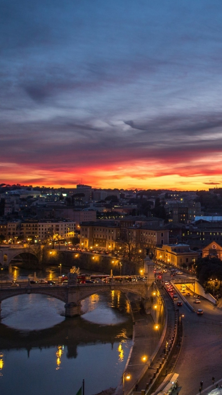Ciudad Con Edificios de Gran Altura Durante la Noche.. Wallpaper in 750x1334 Resolution