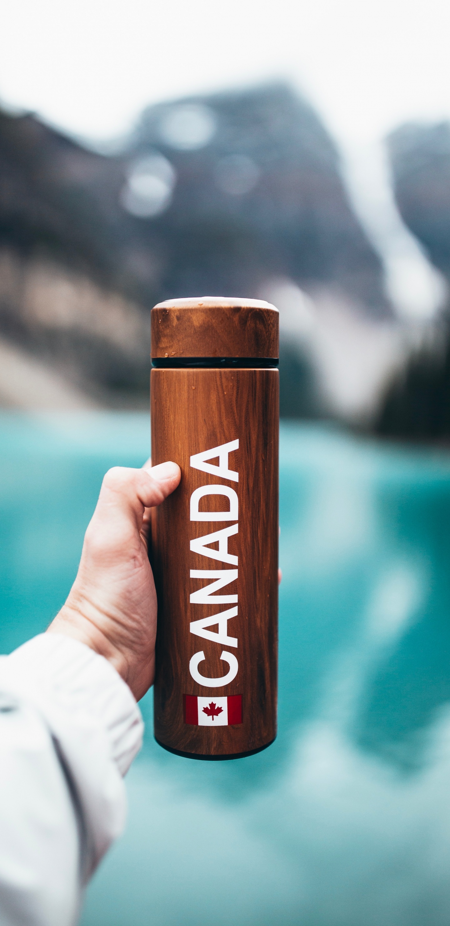 Person Holding Brown Wooden Bar. Wallpaper in 1440x2960 Resolution