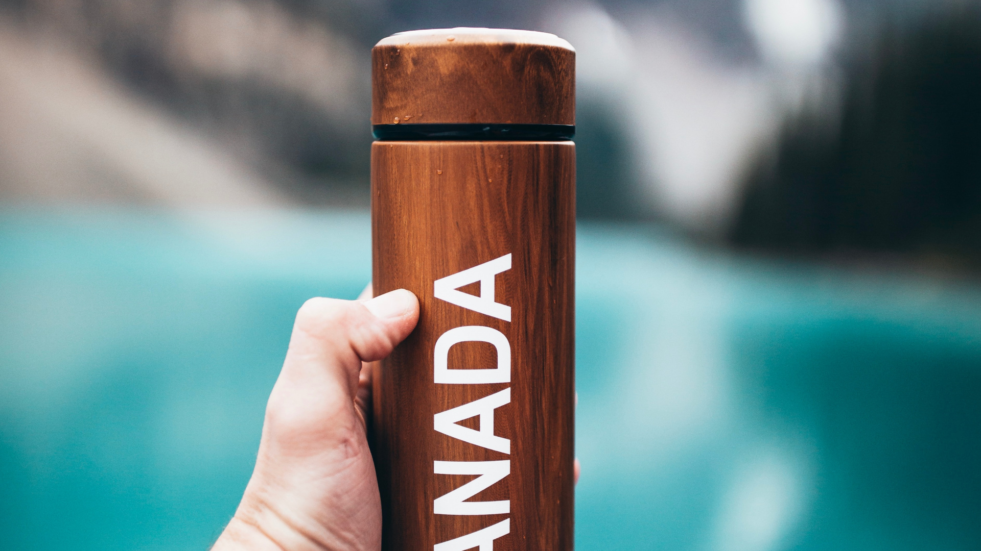 Person Holding Brown Wooden Bar. Wallpaper in 1920x1080 Resolution