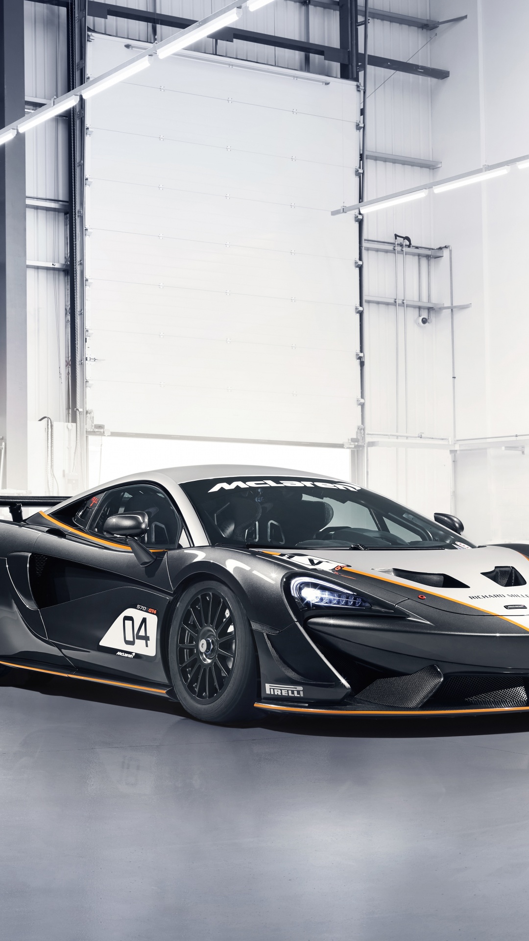 Black and White Porsche 911 Parked in a Garage. Wallpaper in 1080x1920 Resolution