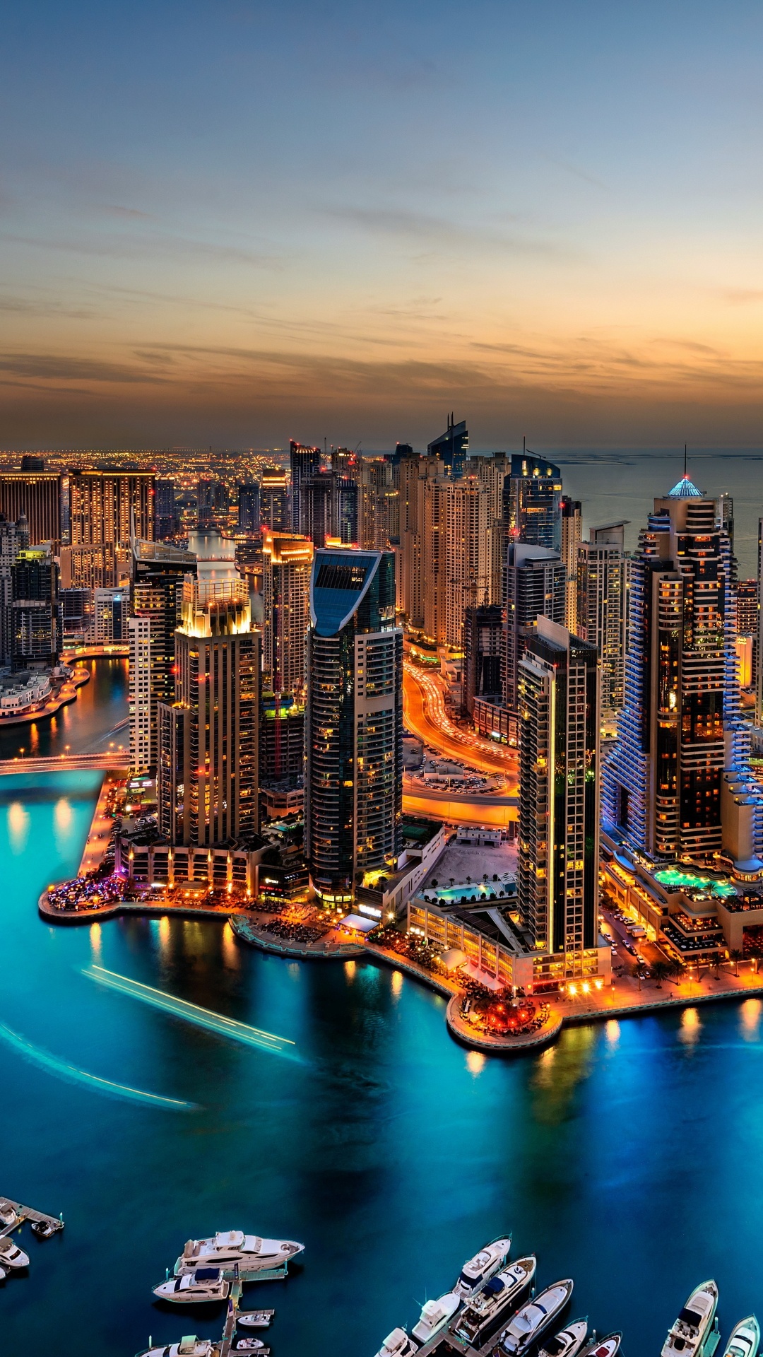 High Rise Buildings Near Body of Water During Night Time. Wallpaper in 1080x1920 Resolution