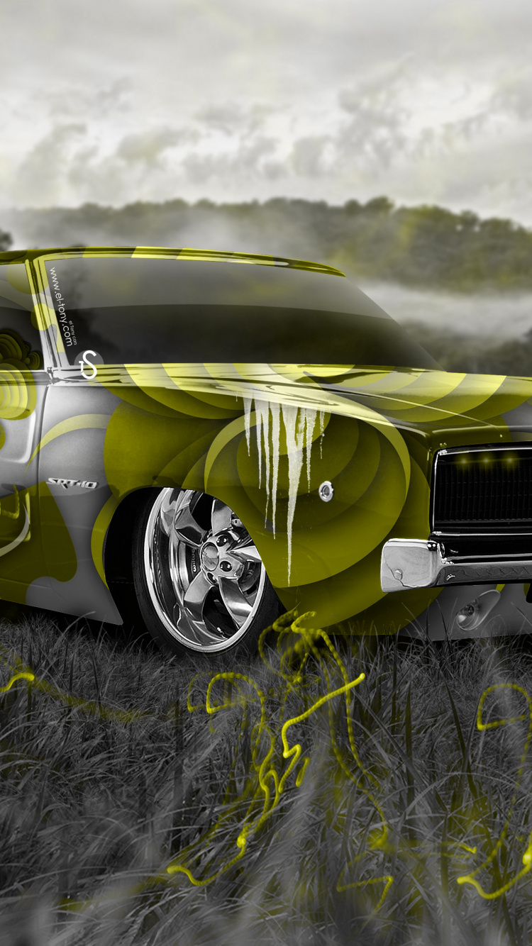 Yellow and Black Chevrolet Camaro on Green Grass Field During Daytime. Wallpaper in 750x1334 Resolution