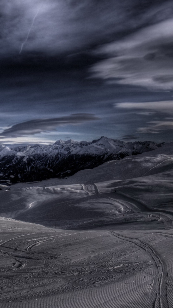 Snow Covered Mountain Under Blue Sky. Wallpaper in 720x1280 Resolution
