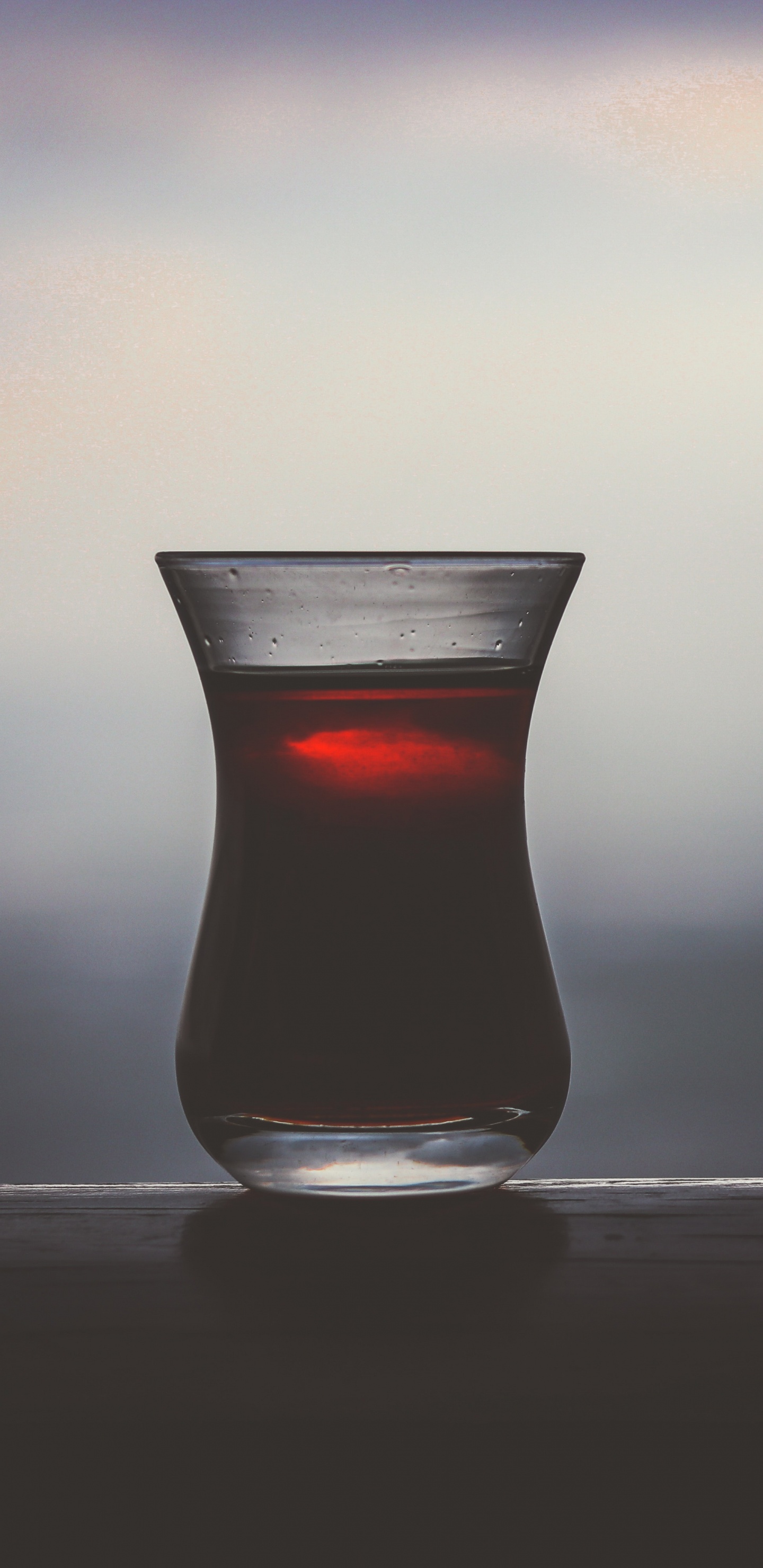 Clear Shot Glass With Red Liquid. Wallpaper in 1440x2960 Resolution