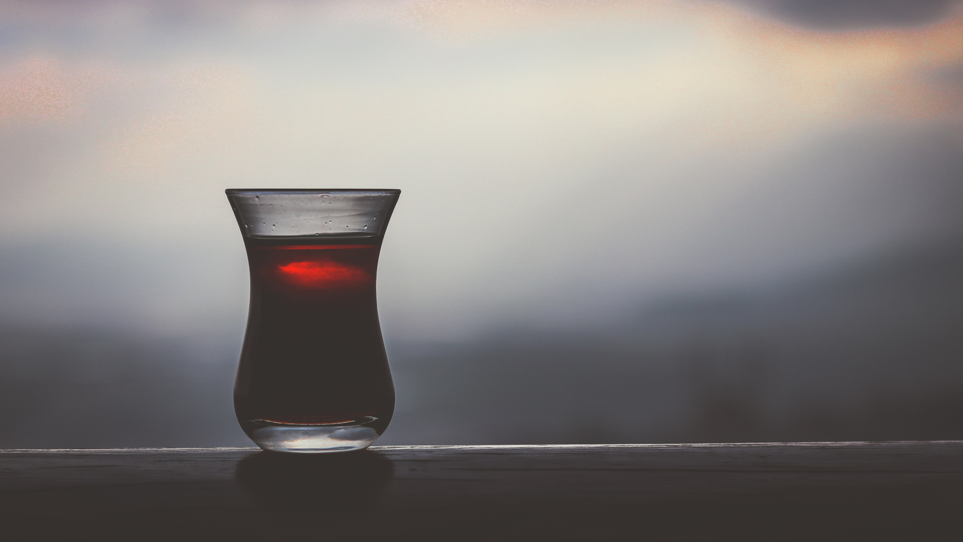 Clear Shot Glass With Red Liquid. Wallpaper in 3840x2160 Resolution