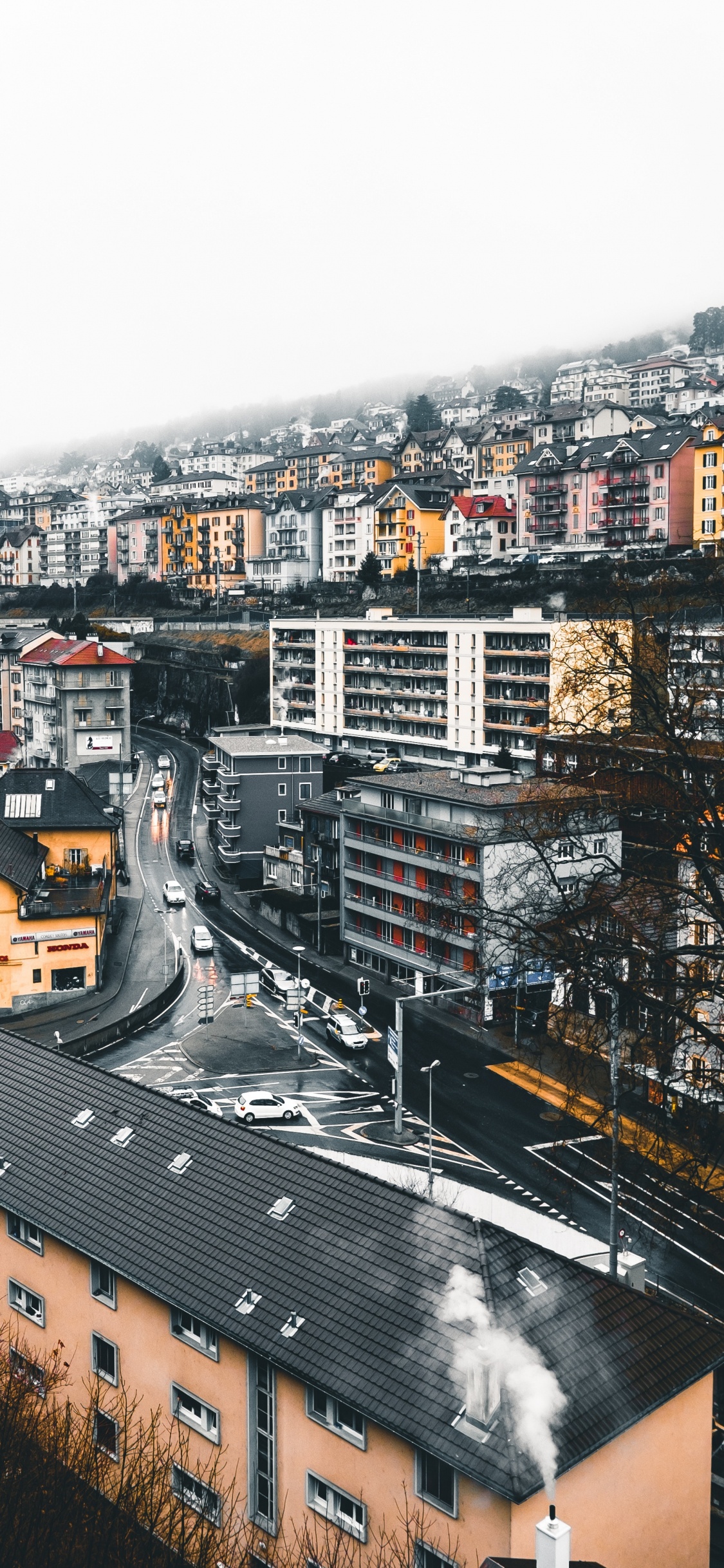 Brown and White Concrete Buildings During Daytime. Wallpaper in 1125x2436 Resolution
