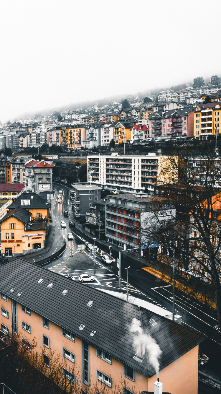 Brown and White Concrete Buildings During Daytime. Wallpaper in 750x1334 Resolution