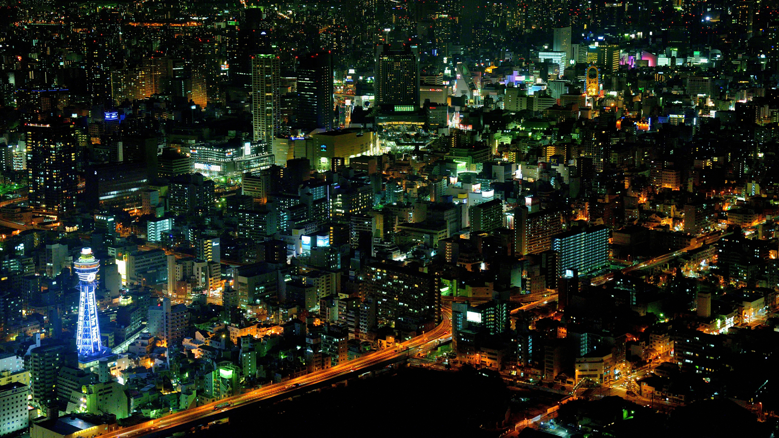 Aerial View of City Buildings During Night Time. Wallpaper in 2560x1440 Resolution