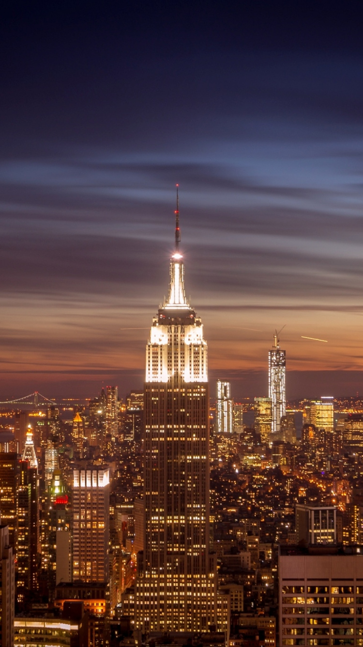 Aerial View of City Buildings During Night Time. Wallpaper in 750x1334 Resolution