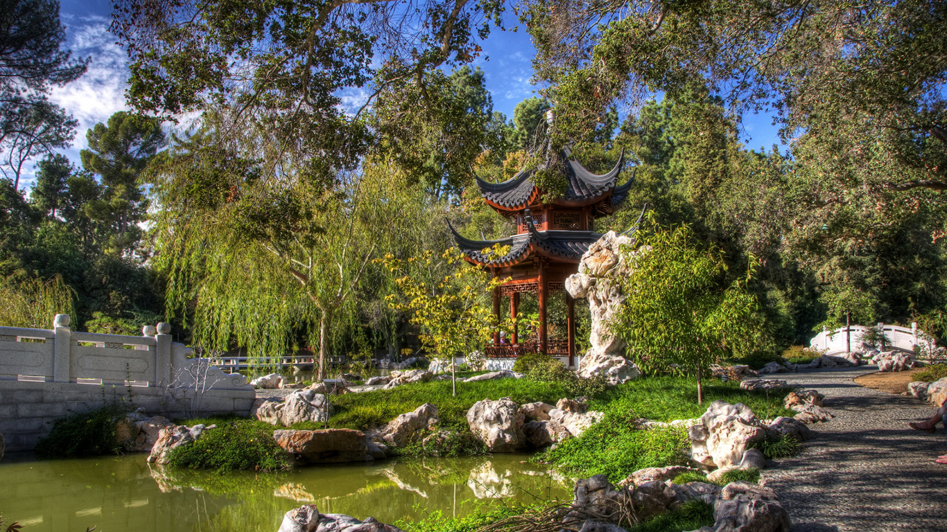 Brown and Black Temple Surrounded by Green Trees During Daytime. Wallpaper in 1366x768 Resolution