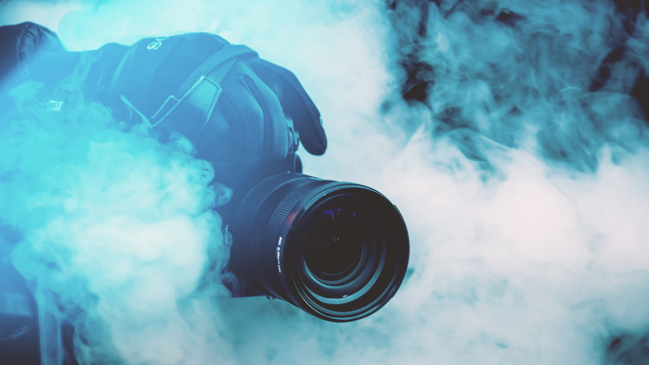 Black Dslr Camera on Blue Smoke. Wallpaper in 2560x1440 Resolution