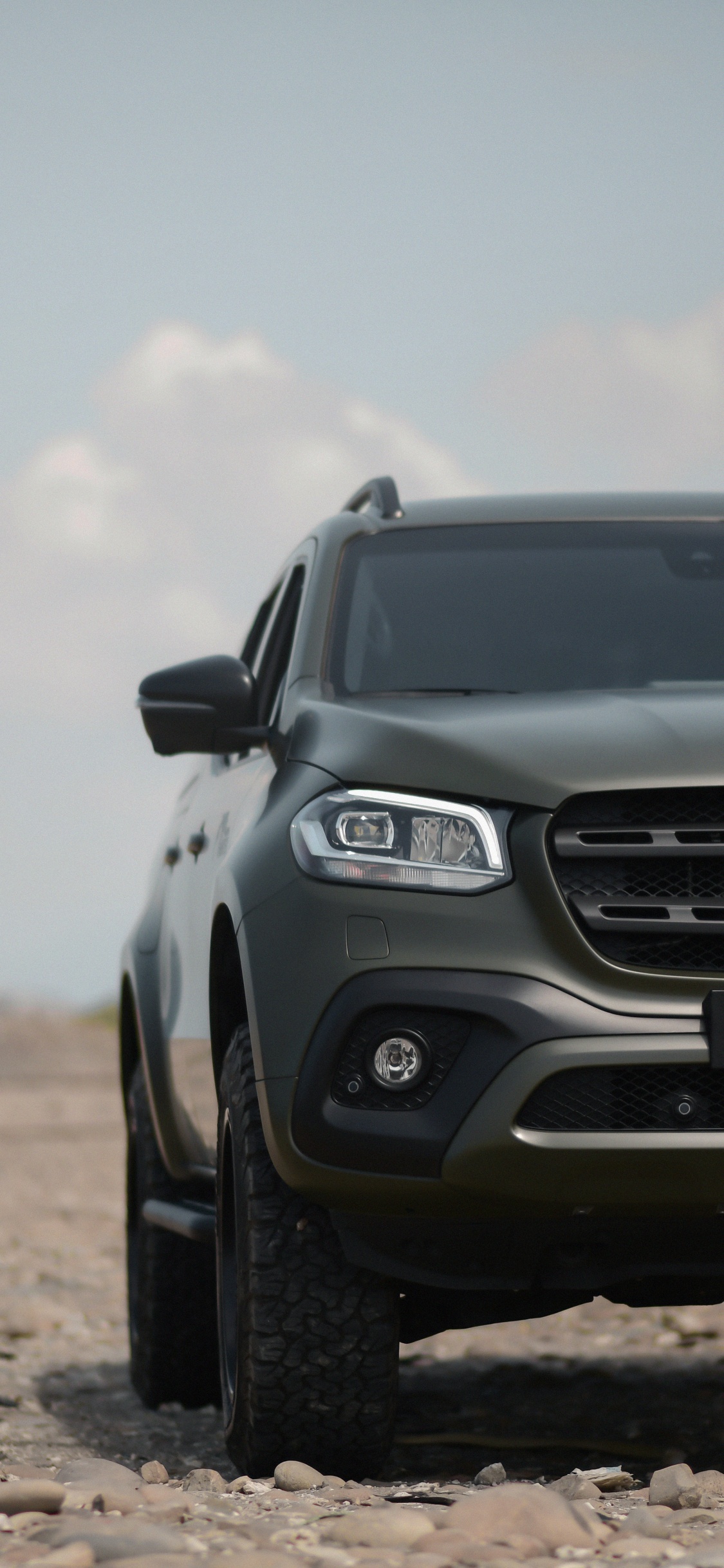 Black Mercedes Benz Car on Brown Soil. Wallpaper in 1125x2436 Resolution