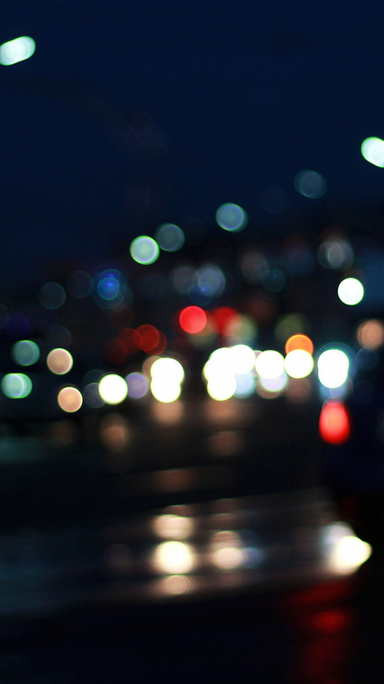 Lichter Der Stadt Während Der Nacht. Wallpaper in 750x1334 Resolution