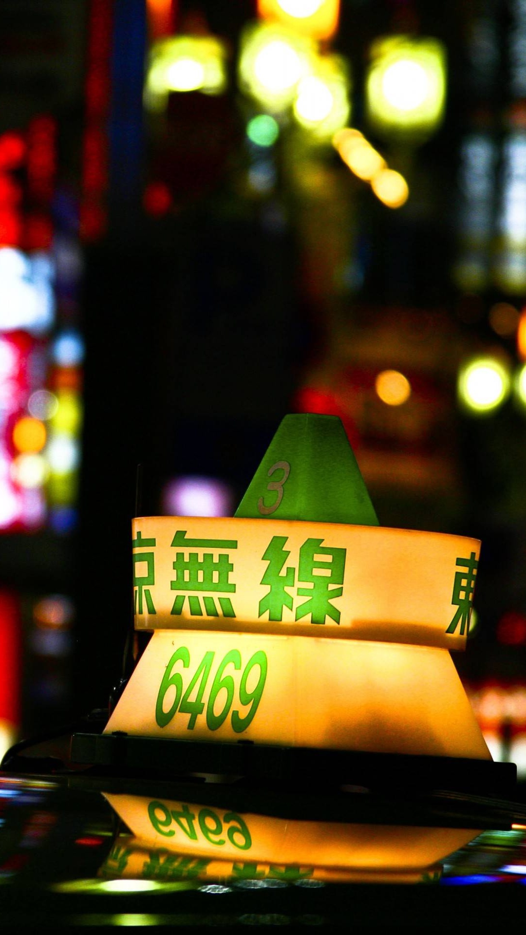 Yellow Taxi Cab on Street During Night Time. Wallpaper in 1080x1920 Resolution