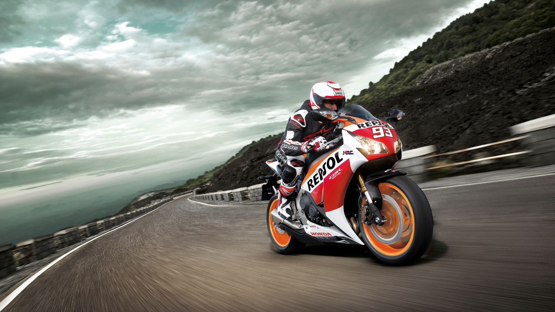 Man Riding on Orange Sports Bike. Wallpaper in 1920x1080 Resolution