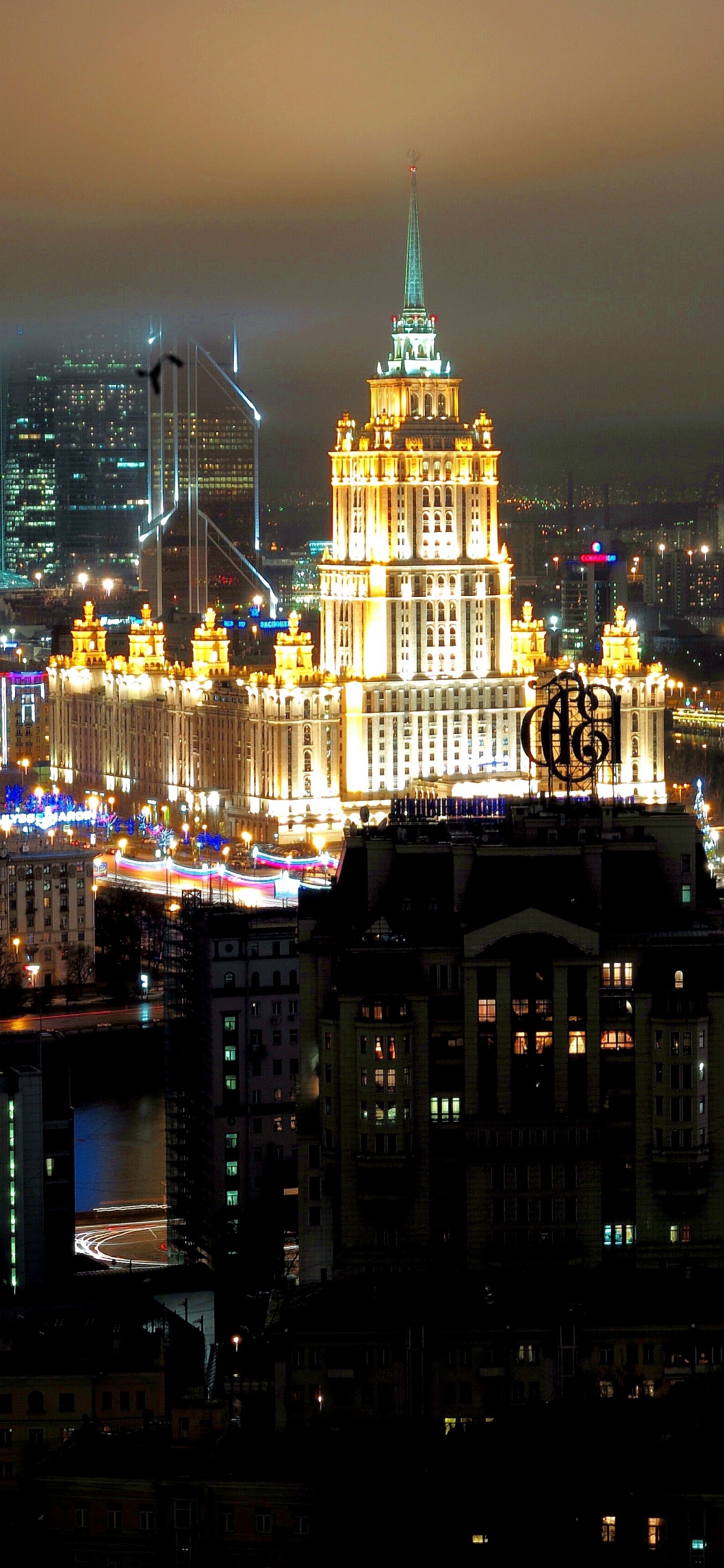 City Skyline During Night Time. Wallpaper in 1242x2688 Resolution