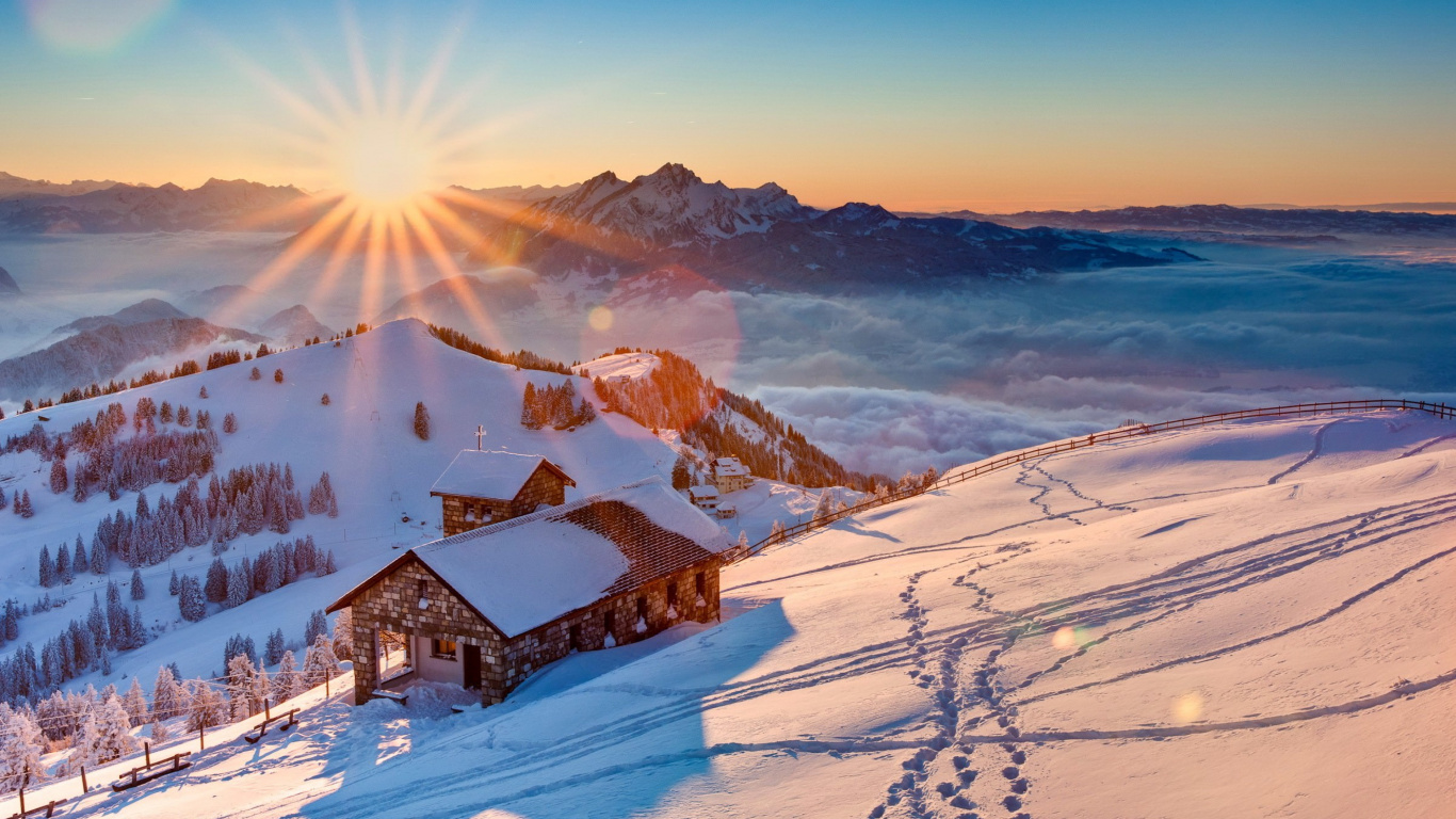 Maison Brune et Blanche Sur un Sol Couvert de Neige Pendant la Journée. Wallpaper in 1366x768 Resolution