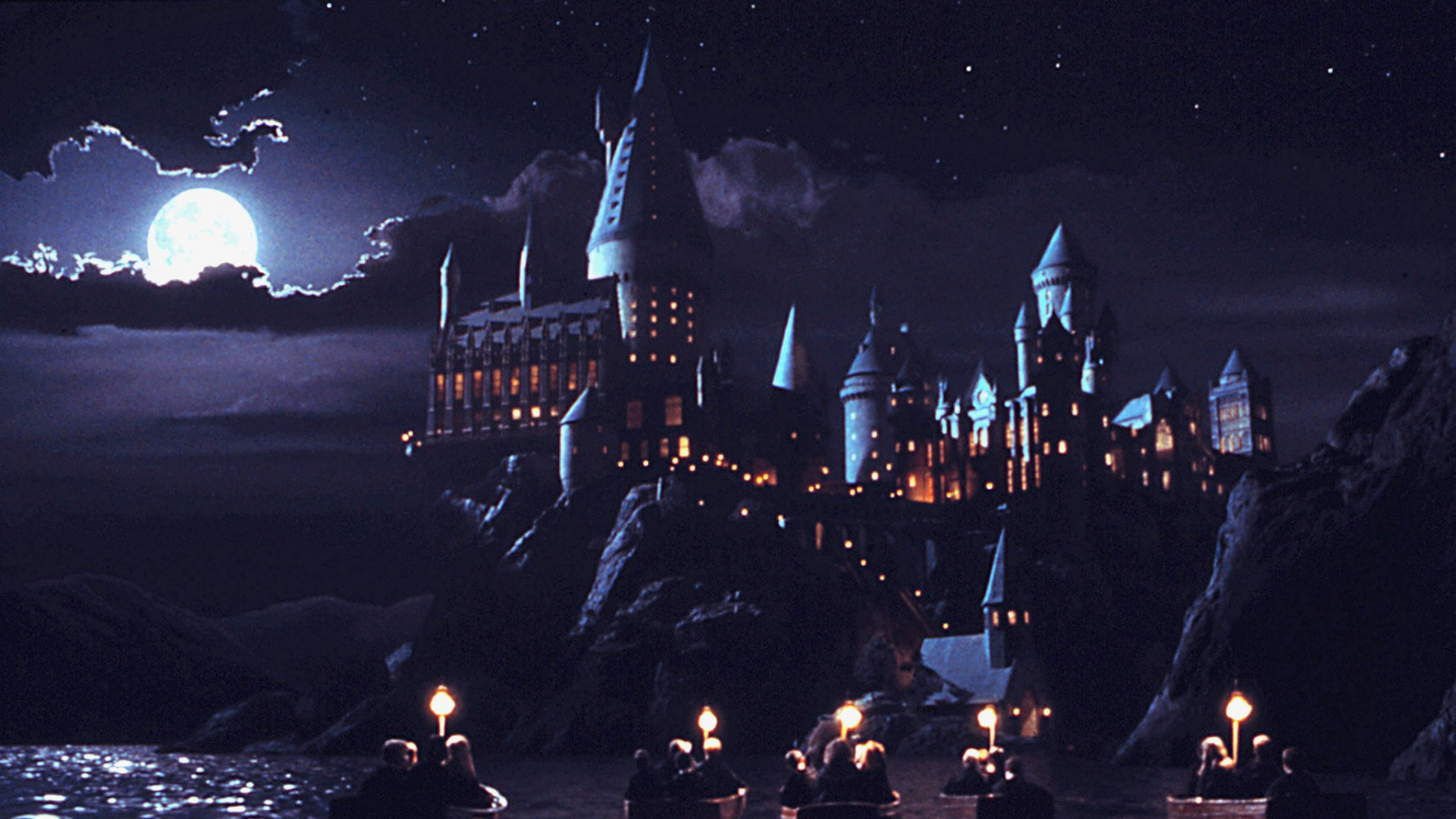 Lighted Castle Near Body of Water During Night Time. Wallpaper in 1920x1080 Resolution